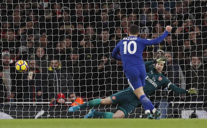 Chelsea s Eden Hazard scoring his sides opening goal during the premier league match at the Emirates Stadium, London. Picture date 3rd January 2018. Picture credit should read: David Klein Sportimage EDITORIAL USE ONLY. No use with unauthorised audio, video, data, fixture lists, club league logos or live services. Online in-match use limited to 120 images, no video emulation. No use in betting, games or single club league player publications.