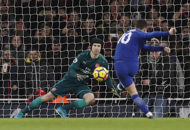 Chelsea s Eden Hazard scoring his sides opening goal during the premier league match at the Emirates Stadium, London. Picture date 3rd January 2018. Picture credit should read: David Klein Sportimage EDITORIAL USE ONLY. No use with unauthorised audio, video, data, fixture lists, club league logos or live services. Online in-match use limited to 120 images, no video emulation. No use in betting, games or single club league player publications.