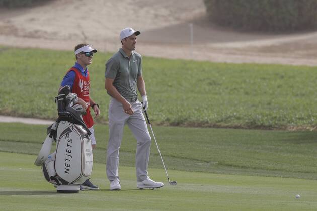 HSBC Abu Dhabi Golf Championship Day Four Ross Fisher and his caddie on Day Four of the HSBC Abu Dhabi Golf Championship at Abu Dhabi Golf Club, UAE. Content Not Available For UK Newspapers Copyright: xNickxWhitworthx FIL-11242-0028