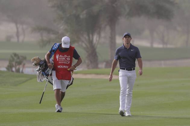HSBC Abu Dhabi Golf Championship Day Four Rory McIlroy and caddie on Day Four of the HSBC Abu Dhabi Golf Championship at Abu Dhabi Golf Club, UAE. Content Not Available For UK Newspapers Copyright: xNickxWhitworthx FIL-11242-0040