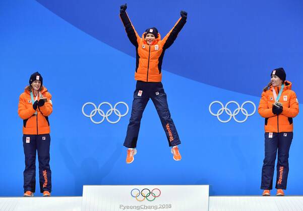 (180211) -- PYEONGCHANG, Feb. 11, 2018 -- Champion Carlijn Achtereekte (C), second-placed Ireen Wust (L) and third-placed Antoinette De Jong, all from the Netherlands, celebrate during the medal ceremony of ladies 3000m event of Speed skating Eisschnelllauf at 2018 PyeongChang Winter Olympic Games Olympische Spiele Olympia OS at the Medal Plaza in PyeongChang, South Korea, on Feb. 11, 2018. ) (SP)OLY-SOUTH KOREA-PYEONGCHANG-SPEED SKATING-LADIES 3000M-MEDAL CEREMONY LuixSiuxWai 