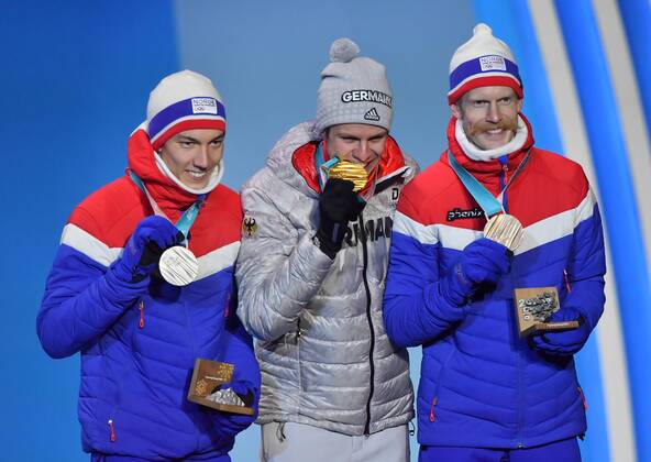 (180211) -- PYEONGCHANG, Feb. 11, 2018 -- Champion Andreas Wellinger from Germany (C), second-placed Johann Andre Forfang (L) from Norway and third-placed Robert Johansson from Norway pose for photos during the medal ceremony of men s normal hill individual event of Ski jumping Skispringen Ski nordisch at 2018 PyeongChang Winter Olympic Games Olympische Spiele Olympia OS at the Medal Plaza in PyeongChang, South Korea, on Feb. 11, 2018. ) (SP)OLY-SOUTH KOREA-PYEONGCHANG-SKI JUMPING-MEN S NORMAL HILL INDIVIDUAL-MEDAL CEREMONY LuixSiuxWai 