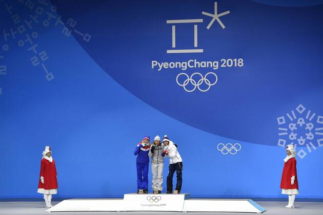L-R Norwegian biathlete Marte Olsbu (silver medal), German biathlete Laura Dahlmeier (gold medal) and Czech biathlete Veronika Vitkova (bronze medal) are seen during the medal ceremony of biathlon, 7,5 KM, women, within the 2018 Winter Olympics in Pyeongchang, South Korea, February 11, 2018. (CTKxPhoto MichalxKamaryt) CTKPhotoP201802110416101  kmt 10