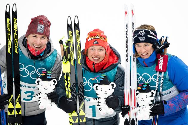 Themen der Woche - SPORT Bilder des Tages - SPORT 180212 Anastasiya Kuzmina of Slovakia, Silver, Laura Dahlmeier of Germany, gold, and Anais Bescond of France, Bronze, celebrates after the Women s Biathlon 10km Pursuit during day three of the 2018 Winter Olympics on February 12, 2018 in Pyeongchang. Photo: Jon Olav Nesvold BILDBYRN kod JE 160156 Copyright: JONxOLAVxNESVOLD BB180212BB239