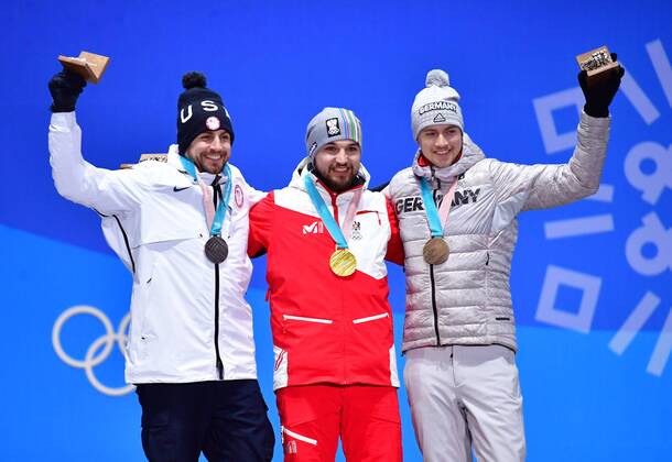 Silver medalist American Chris Mazdzer (L), gold medalist Austria s David Gleirscher and bronze medalist Germany s Johannes Ludwig pose together during the medal ceremony for Men s Luge during the Pyeongchang 2018 Winter Olympics in Pyeongchang, South Korea, on February 12, 2018.  OLY201802123614 KEVINxDIETSCH