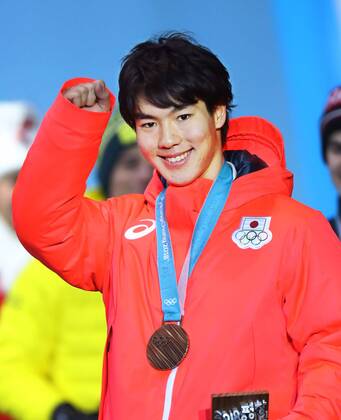 Pyeongchang Olympics Daichi Hara of Japan poses with his freestyle skiing moguls bronze medal at the Pyeongchang Winter Olympics in South Korea on Feb. 13, 2018. 