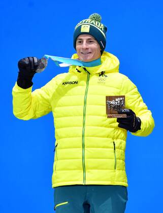 Silver medalist Australia s Matt Graham celebrates during the medal ceremony for Men s Moguls at the medal s plaza during the Pyeongchang 2018 Winter Olympics in Pyeongchang, South Korea, on February 13, 2018.  OLY20180213360 KEVINxDIETSCH