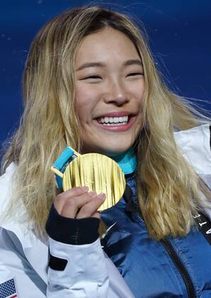 Gold medalist American Chloe Kim celebrates during the medal ceremony for Ladies Snowboard Halfpipe at the medal s plaza during the Pyeongchang 2018 Winter Olympics in Pyeongchang, South Korea, on February 13, 2018.  OLY20180213386c KEVINxDIETSCH