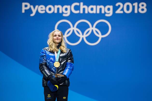 180214 Stina Nilsson of Sweden, Gold, celebrates at the medal ceremony for the Men s Cross Country Sprint during day five of the 2018 Winter Olympics on February 14, 2018 in Pyeongchang. Photo: Carl Sandin BILDBYRAN kod CS 57999_292 Copyright: CARLxSANDIN BB180214CS104