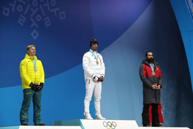 OLYMPICS - 2018 Winter Olympics PYEONGCHANG,SOUTH KOREA,15.FEB.18 - OLYMPICS, SNOWBOARDING - Olympic Winter games Winterspiele Spiele Summer games PyeongChang 2018, Medals Plaza, snowboard cross, men, award ceremony. Image shows Jarryd Hughes (AUS), Pierre Vaultier (FRA) and Regino Hernandez (ESP). Keywords: medal. GEPAxpictures xAndreasxPranter