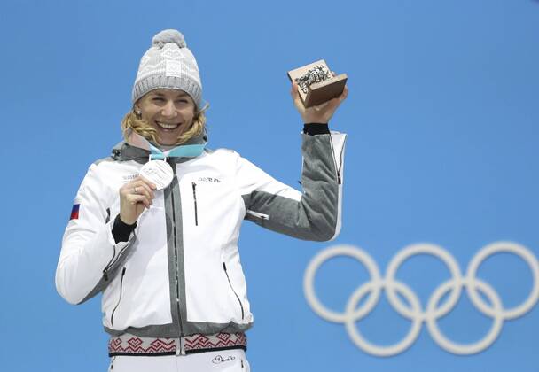 (180216) -- PYEONGCHANG, Feb. 16, 2018 -- Silver medalist Anastasiya Kuzmina from Slovakia poses for photos during medal ceremony of the women s 15km individual of biathlon at the 2018 PyeongChang Winter Olympic Games Olympische Spiele Olympia OS at Medal Plaza, PyeongChang, South Korea, Feb. 16. 2018. ) (SP)OLY-SOUTH KOREA-PYEONGCHANG-BIATHLON-WOMEN S 15KM INDIVIDUAL-MEDAL CEREMONY BaixXuefei 