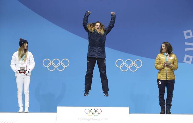 (180216) -- PYEONGCHANG, Feb. 16, 2018 -- Gold medalist Michela Moioli of Italy (C), silver medalist Julia Pereira De Sousa Mabileau of France (L) and bronze medalist Eva Samkova of the Czech Republic react during medal ceremony of ladies snowboard cross at the 2018 PyeongChang Winter Olympic Games Olympische Spiele Olympia OS at Medal Plaza, South Korea, on Feb. 16, 2018. ) (SP)OLY-SOUTH KOREA-PYEONGCHANG-SNOW BOARD-LADIES CROSS FINAL-MEDAL CEREMONY BaixXuefei 
