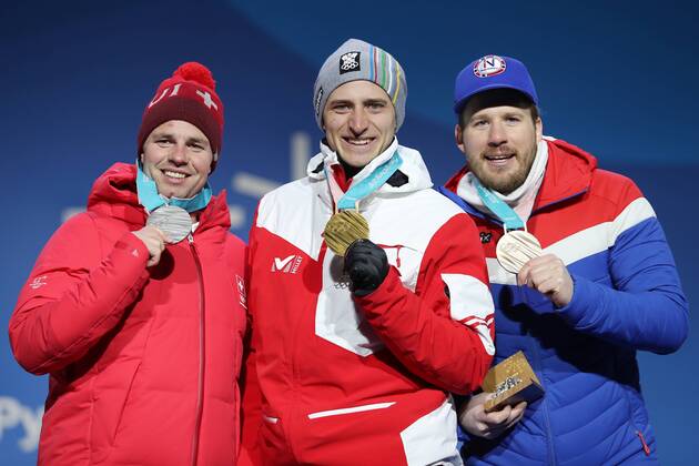 OLYMPICS - 2018 Winter Olympics PYEONGCHANG,SOUTH KOREA,16.FEB.18 - OLYMPICS, ALPINE SKIING - Olympic Winter games Winterspiele Spiele Summer games PyeongChang 2018, Medals Plaza, Super G, men, award ceremony. Image shows Beat Feuz (SUI), Matthias Mayer (AUT) and Kjetil Jansrud (NOR). GEPAxpictures xMathiasxMandl
