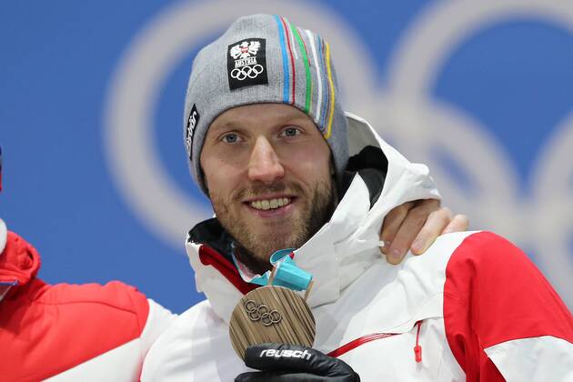 OLYMPICS - 2018 Winter Olympics PYEONGCHANG,SOUTH KOREA,16.FEB.18 - OLYMPICS,BIATHLON - Olympic Winter games Winterspiele Spiele Summer games PyeongChang 2018, Medals Plaza, 20km biathlon, men, award ceremony. Image shows Dominik Landertinger (AUT). GEPAxpictures xMathiasxMandl