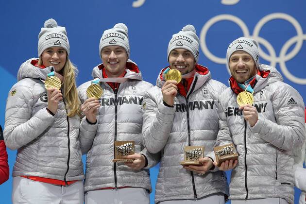 OLYMPICS - 2018 Winter Olympics PYEONGCHANG,SOUTH KOREA,16.FEB.18 - OLYMPICS,LUGE - Olympic Winter games Winterspiele Spiele Summer games PyeongChang 2018, Medals Plaza, team relay, award ceremony. Image shows Natalie Geisenberger, Johannes Ludwig, Tobias Wendl and Tobias Arlt (GER). GEPAxpictures xMathiasxMandl