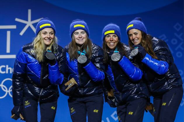 PyeongChang 2018 - Langlauf, 4x5km Staffel Damen Siegerehrung PYEONGCHANG, SOUTH KOREA - FEBRUARY 18, 2018: Silver medalists Stina Nilsson, Ebba Andersson, Charlotte Kalla, and Anna Haag (L-R) of Sweden pose at a victory ceremony for the ladies cross-country skiing 4x5km relay race at the 2018 Winter Olympic Games Olympische Spiele Olympia OS at the Alpensia Cross-Country Skiing Centre. Valery Sharifulin TASS  TS0747C8