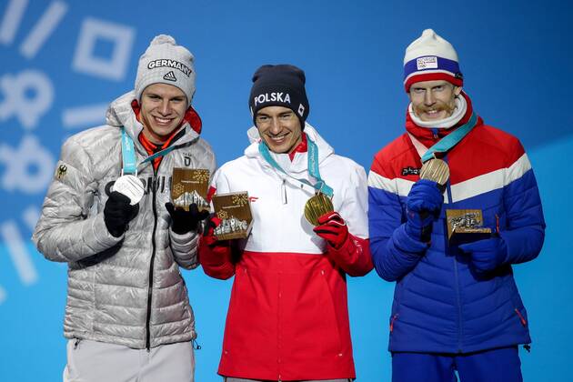 OLYMPICS - 2018 Winter Olympics PYEONGCHANG,SOUTH KOREA,18.FEB.18 - OLYMPICS, NORDIC SKIING, Ski jumping Skispringen Ski nordisch - Olympic Winter games Winterspiele Spiele Summer games PyeongChang 2018, Medals Plaza, large hill, men, award ceremony. Image shows Andrea Wellinger (GER), Kamil Stoch (POL) and Robert Johansson (NOR). Keywords: medals. GEPAxpictures xMaticxKlansek
