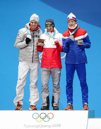 OLYMPICS - 2018 Winter Olympics PYEONGCHANG,SOUTH KOREA,18.FEB.18 - OLYMPICS, NORDIC SKIING, Ski jumping Skispringen Ski nordisch - Olympic Winter games Winterspiele Spiele Summer games PyeongChang 2018, Medals Plaza, large hill, men, award ceremony. Image shows Andrea Wellinger (GER), Kamil Stoch (POL) and Robert Johansson (NOR). Keywords: medals. GEPAxpictures xMaticxKlansek