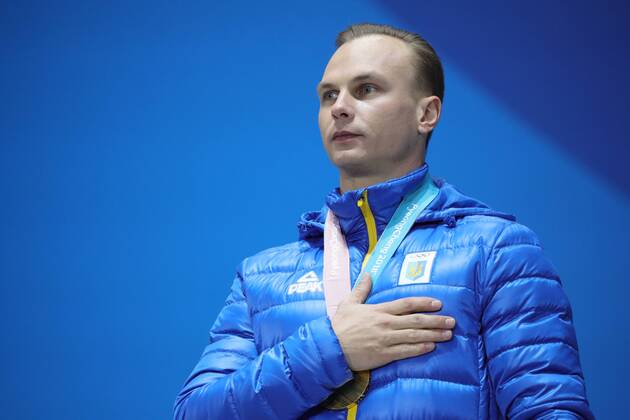 PYEONGCHANG, SOUTH KOREA â€“ FEBRUARY 19, 2018: Gold medallist Oleksandr Abramenko of Ukraine poses at a victory ceremony for the men s freestyle skiing aerials at the 2018 Winter Olympic Games Olympische Spiele Olympia OS Sergei Bobylev TASS  TS074A5E