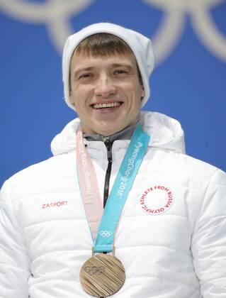 PYEONGCHANG, SOUTH KOREA â€“ FEBRUARY 19, 2018: Olympic Athlete from Russia Ilya Burov poses with his bronze medal at a victory ceremony for the men s freestyle skiing aerials at the 2018 Winter Olympic Games Olympische Spiele Olympia OS Sergei Bobylev TASS  TS074A76
