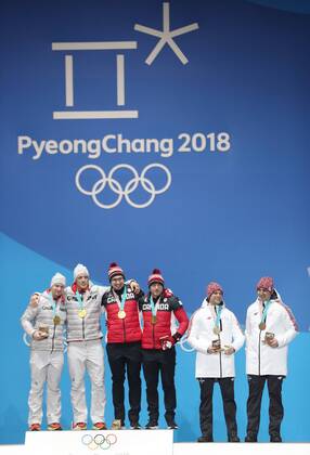 (180220) -- PYEONGCHANG, Feb. 20, 2018 -- Gold medalists Germany s Francesco Friedrich and Thorsten Margis, Canada s Justin Kripps and Alexander Kopacz (L to R), bronze medalists Latvia s Oskars Melbardis and Janis Strenga pose for photos during medal ceremony of 2-man event of bobsleigh at the 2018 PyeongChang Winter Olympic Games Olympische Spiele Olympia OS at Medal Plaza, PyeongChang, South Korea, Feb. 20, 2018. ) (SP)OLY-SOUTH KOREA-PYEONGCHANG-BOBSLEIGH-2-MAN-MEDAL CEREMONY WuxZhuang 
