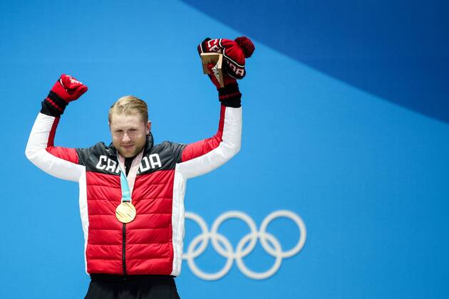 OLYMPICS - 2018 Winter Olympics PYEONGCHANG,SOUTH KOREA,21.FEB.18 - OLYMPICS,FREESTYLE SKIING - Olympic Winter games Winterspiele Spiele Summer games PyeongChang 2018, Medals Plaza, downhill, Ski Cross, men, award ceremony. Image shows Brady Leman (CAN). Keywords: medal. GEPAxpictures xMaticxKlansek