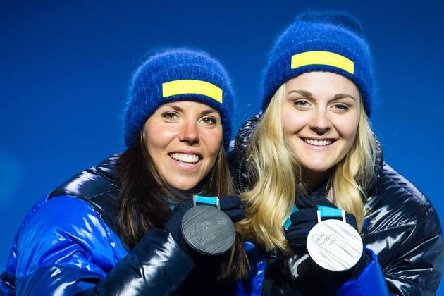 180222 Charlotte Kalla and Stina Nilsson of Sweden, Silver, celebrates with the medals at the Medal Ceremony during day thirteen of the 2018 Winter Olympics on February 22, 2018 in Pyeongchang. Photo: Carl Sandin BILDBYRAN kod CS 57999_316 Copyright: CARLxSANDIN BB180222CS031