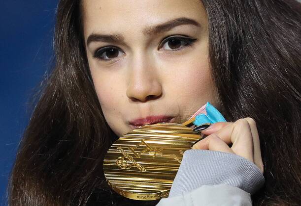 PYEONGCHANG, SOUTH KOREA â€“ FEBRUARY 23, 2018: Figure skater Alina Zagitova, Olympic Athlete from Russia, poses with her gold medal at a victory ceremony for the ladies Figure skating Eiskunstlauf event at the 2018 Winter Olympic Games Olympische Spiele Olympia OS Sergei Bobylev TASS  TS07570F