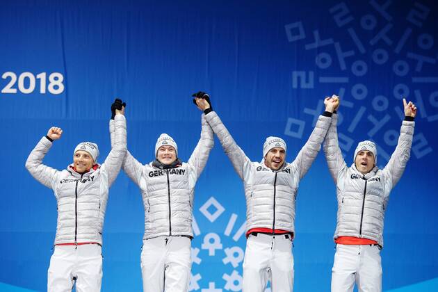 180224 Erik Lesser, Benedikt Doll, Arnd Peiffer and Simon Schempp of Germany, Bronze celebrates at the Medal Ceremony for the Men s Biathlon 4x7,5 km relay during day fifteen of the 2018 Winter Olympics on February 24, 2018 in Pyeongchang. Photo: Carl Sandin BILDBYRAN kod CS 57999_322 Copyright: CARLxSANDIN BB180224CS119