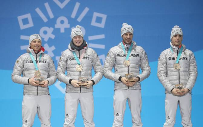 (180224) -- PYEONGCHANG, Feb. 24, 2018 -- Third-placed team Germany pose for photos during medal ceremony of men s 4x7.5km relay of biathlon at the 2018 PyeongChang Winter Olympic Games Olympische Spiele Olympia OS at Medal Plaza, PyeongChang, South Korea, Feb. 24, 2018. ) (SP)OLY-SOUTH KOREA-PYEONGCHANG-BIATHLON-MEN S 4X7.5KM RELAY-MEDAL CEREMONY LixGang 