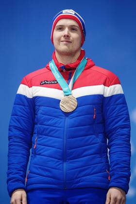 180224 Magnus Nedregotten of Norway, awarded a bronze after a russian athlete was disqualified, celebrate at the Medal Ceremony for the Mixed Double Curling Event during day fifteen of the 2018 Winter Olympics on February 24, 2018 in Pyeongchang. Photo: Carl Sandin BILDBYRAN kod CS 57999_322 Copyright: CARLxSANDIN BB180224CS151