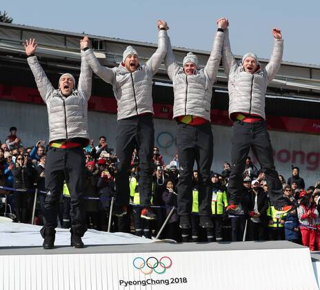 (180225) -- PYEONGCHANG, Feb. 25, 2018 -- Team Germany that won the gold medal celebrate after the 4-man event of bobsleigh at the 2018 PyeongChang Winter Olympic Games Olympische Spiele Olympia OS at Olympic Sliding Centre, PyeongChang, South Korea, Feb. 25, 2018. The team won the gold medal in a time of 3:15.85. ) (SP)OLY-SOUTH KOREA-PYEONGCHANG-BOBSLEIGH-4-MAN BaixXuefei 