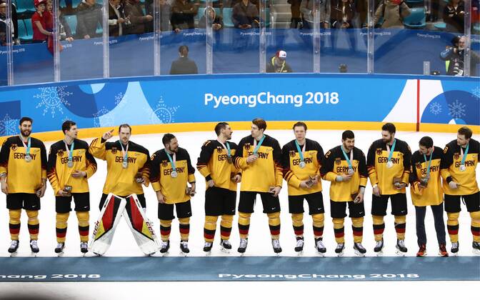 GANGNEUNG, SOUTH KOREA - FEBRUARY 25, 2018: Silver medalists, players of Germany at a victory ceremony for the men s Ice hockey Eishockey event at Gangneung Hockey Centre at the 2018 Winter Olympic Games Olympische Spiele Olympia OS The Olympic Athletes from Russia won 4-3 in overtime. Valery Sharifulin TASS  TS075A6C