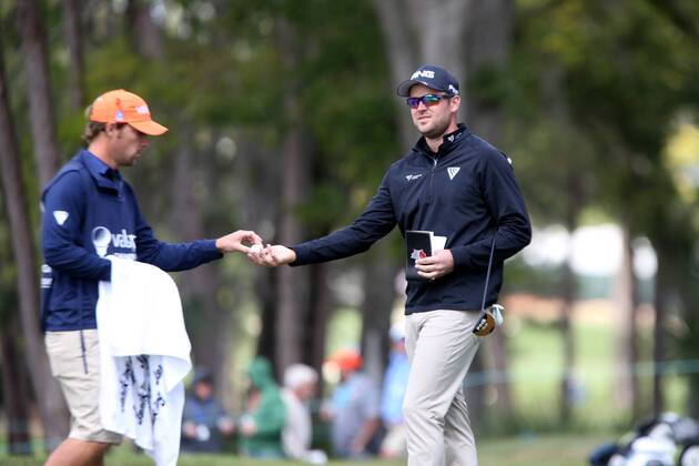 March 8, 2018 - Palm Harbor, Florida, U.S. - DOUGLAS R. CLIFFORD Times .Corey Conners, right, prepares to putt at the 13th hole while playing the Copperhead Course on Thursday (3 8 18) during the first round of the Valspar Championship at the Innisbrook Golf and Spa Resort in Palm Harbor. Florida News - March 8, 2018 - ZUMAs70_ 82203485st Copyright: xDouglasxR.xCliffordx