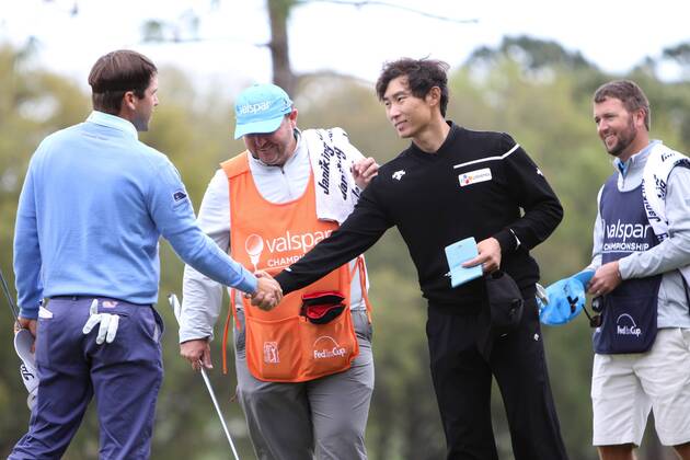 March 8, 2018 - Palm Harbor, Florida, U.S. - DOUGLAS R. CLIFFORD Times .Ben Martin, left, and Whee Kim talk at the end of their round at the 18th green while playing the Copperhead Course on Thursday (3 8 18) during the first round of the Valspar Championship at the Innisbrook Golf and Spa Resort in Palm Harbor. Florida News - March 8, 2018 - ZUMAs70_ 82203493st Copyright: xDouglasxR.xCliffordx