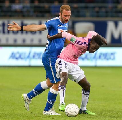 - GENT, BELGIUM: Gent s Laurent Depoitre and Anderlecht s Fabrice N Sakala fight for the ball during the Jupiler Pro League match between KAA Gent and RSC Anderlecht, Thursday 30 April 2015 in Gent, on the fifth day of the Play-off 1. VIRGINIExLEFOUR x80473886x