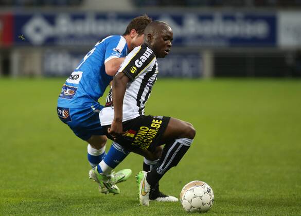 - GENT, BELGIUM: Gent s Brecht Dejaegere and Charleroi s Neeskens Kebano fight for the ball during the Jupiler Pro League match between KAA Gent and Sporting Charleroi, Friday 08 May 2015 in Gent, on the seventh day of the Play-off 1. VIRGINIExLEFOUR x80803431x
