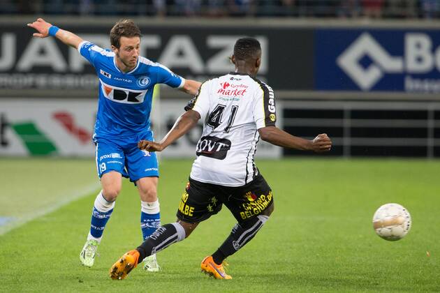 - GENT, BELGIUM: Gent s Brecht Dejaegere and Charleroi s Francis N Ganga fight for the ball during the Jupiler Pro League match between KAA Gent and Sporting Charleroi, Friday 08 May 2015 in Gent, on the seventh day of the Play-off 1. KURTxDESPLENTER x80804244x