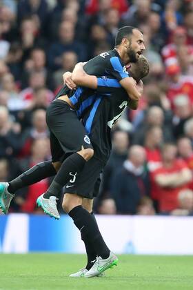 - MANCHESTER, UNITED KINGDOM: Club s Laurens De Bock and Club s Victor Vazquez Solsona celebrate after a goal during a soccer game between British club Manchester United ManU FC and Belgian team Club Brugge KV in Manchester, United Kingdom, Tuesday 18 August 2015, the first leg of the play-offs for the UEFA Champions League competition. BRUNOxFAHY x84377863x