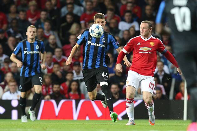 - MANCHESTER, UNITED KINGDOM: Club s Brandon Mechele and Manchester s Wayne Rooney fight for the ball during a soccer game between British club Manchester United ManU FC and Belgian team Club Brugge KV in Manchester, United Kingdom, Tuesday 18 August 2015, the first leg of the play-offs for the UEFA Champions League competition. BRUNOxFAHY x84380776x