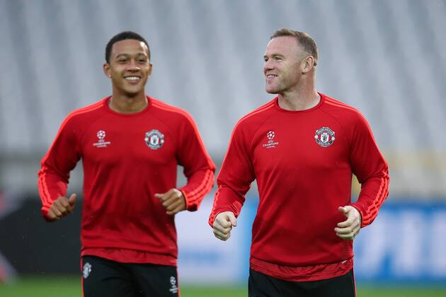 - BRUGGE, BELGIUM: Manchester s Memphis Depay and Manchester s Wayne Rooney pictured during a training session of British soccer club Manchester United ManU in Brugge, Tuesday 25 August 2015. Tomorrow Belgian first league soccer team Club Brugge will play the return game of the play-offs of the Uefa Champions League competition against British soccer club Manchester United FC. Manchester United won the first leg 3-1. BRUNOxFAHY x84611414x