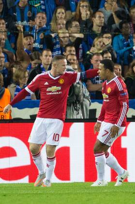 - BRUGGE, BELGIUM: Manchester s Wayne Rooney (L) celebrates with his teammates after scoring during a soccer game between Belgian first league team Club Brugge KV and British club Manchester United ManU FC in Brugge, Wednesday 26 August 2015, the return game of the play-offs of the UEFA Champions League competition. Manchester United won the first leg 3-1. KURTxDESPLENTER x84638066x