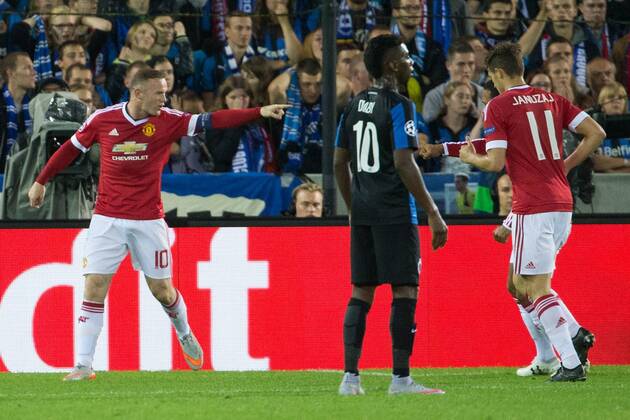 - BRUGGE, BELGIUM: Manchester s Wayne Rooney (L) celebrates with his teammates after scoring during a soccer game between Belgian first league team Club Brugge KV and British club Manchester United ManU FC in Brugge, Wednesday 26 August 2015, the return game of the play-offs of the UEFA Champions League competition. Manchester United won the first leg 3-1. KURTxDESPLENTER x84638069x