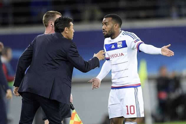 - GENT, BELGIUM: Lyon s head coach Hubert Fournier and Lyon s Alexandre Lacazette pictured during the first game in the group stage of the Uefa Champions League competition, in group H, between Belgian first league soccer team KAA Gent and Olympique Lyon, in Gent, Wednesday 16 September 2015. YORICKxJANSENS x85279466x