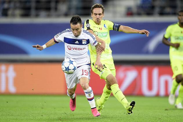 - GENT, BELGIUM: Lyon s Mathieu Valbuena and Gent s Sven Kums fight for the ball during the first game in the group stage of the Uefa Champions League competition, in group H, between Belgian first league soccer team KAA Gent and Olympique Lyon, in Gent, Wednesday 16 September 2015. YORICKxJANSENS x85281224x