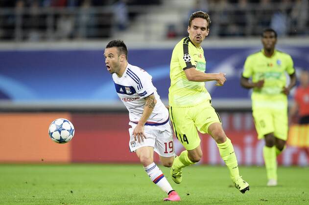 - GENT, BELGIUM: Lyon s Mathieu Valbuena and Gent s Sven Kums fight for the ball during the first game in the group stage of the Uefa Champions League competition, in group H, between Belgian first league soccer team KAA Gent and Olympique Lyon, in Gent, Wednesday 16 September 2015. YORICKxJANSENS x85281226x