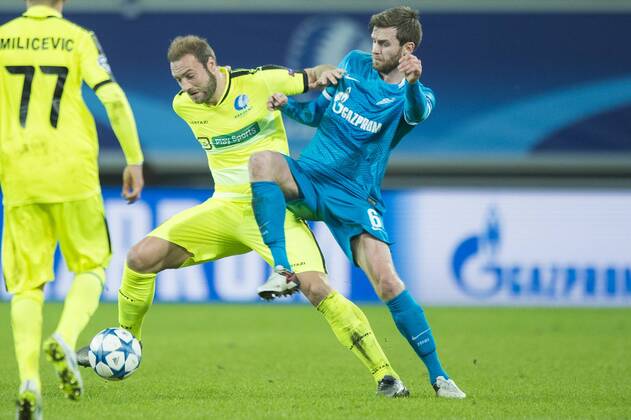 - GENT, BELGIUM: Gent s Laurent Depoitre and Zenit s Nicolas Lombaerts fight for the ball during a soccer game between Belgian team KAA Gent and Russian club FC Zenit Saint Petersburg, Wednesday 09 December 2015, in Gent, the sixth and last day of the group stage the UEFA Champions League competition, in group H. JASPERxJACOBS x88058469x