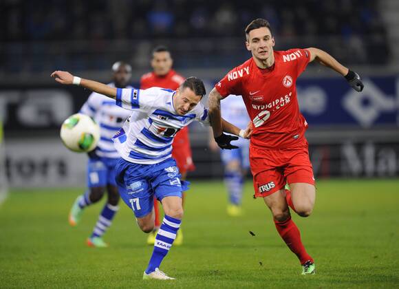 - GENT, BELGIUM: Gent s Danijel Milicevic and Kortrijk s Zarko Tomasevic fight for the ball during the Jupiler Pro League match between AA Gent and KV Kortrijk, in Gent, Saturday 18 January 2014, on the twenty-second day of the Belgian soccer championship. JOHNxTHYS x51960392x