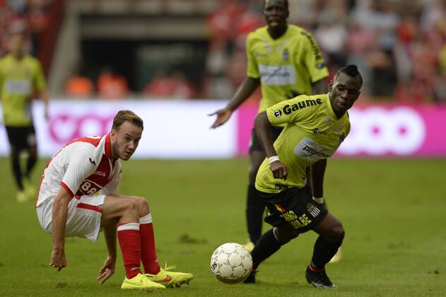 - LIEGE, BELGIUM: Standard d Francois Marquet and Charleroi s Lynel Kitambala pictured in action during the Jupiler Pro League match between Standard de Liege and RSC Charleroi, in Liege, Friday 25 July 2014, on day 1 of the Belgian soccer championship. JASPERxJACOBS x60582843x
