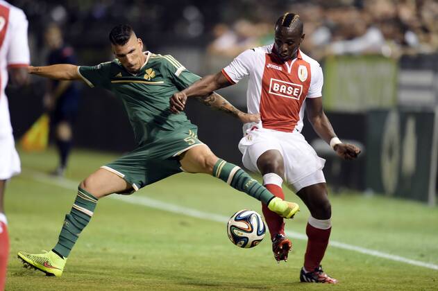 - LIEGE, BELGIUM: Panathinaikos Konstantino Triantafyllopoulos and Standard s Paul-Jose Mpoku Ebunge fight for the ball during the return leg match between Greek soccer team Panathinaikos and Belgian first league soccer team Standard de Liege in the third qualifying round of the UEFA Champions League competition, Tuesday 05 August 2014, in Athens. The first leg match resulted in a 0-0 draw. YORICKxJANSENS  x60889736x